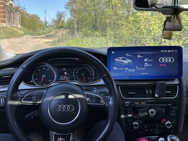 Чорний Ауді А4, об'ємом двигуна 2 л та пробігом 161 тис. км за 13400 $, фото 12 на Automoto.ua