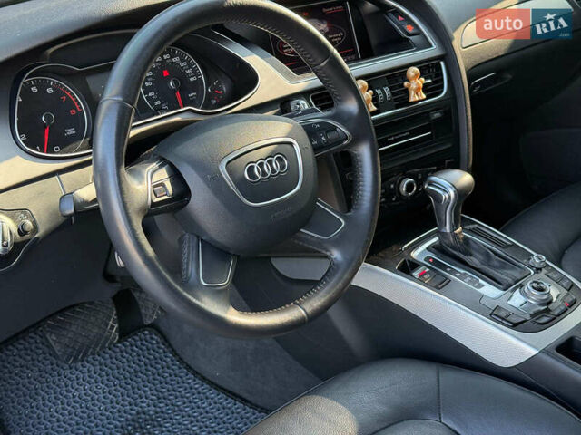 Чорний Ауді А4, об'ємом двигуна 2 л та пробігом 235 тис. км за 11790 $, фото 15 на Automoto.ua