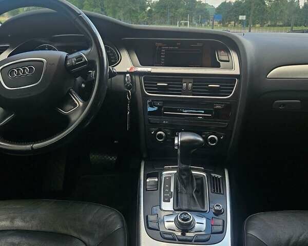 Чорний Ауді А4, об'ємом двигуна 2 л та пробігом 202 тис. км за 12800 $, фото 7 на Automoto.ua