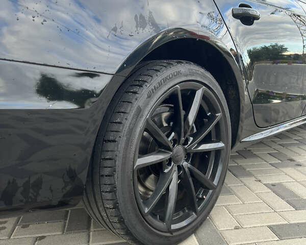 Черный Ауди А4, объемом двигателя 1.98 л и пробегом 75 тыс. км за 15700 $, фото 11 на Automoto.ua