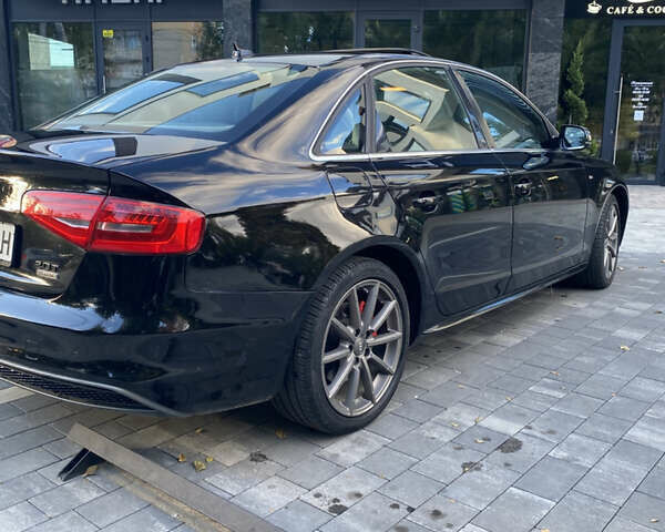 Черный Ауди А4, объемом двигателя 2 л и пробегом 208 тыс. км за 13600 $, фото 3 на Automoto.ua