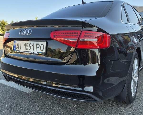 Чорний Ауді А4, об'ємом двигуна 2 л та пробігом 176 тис. км за 13800 $, фото 3 на Automoto.ua