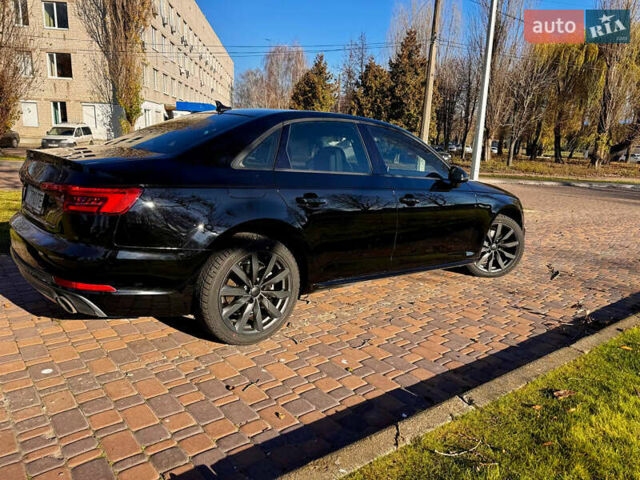 Чорний Ауді А4, об'ємом двигуна 2 л та пробігом 129 тис. км за 18900 $, фото 2 на Automoto.ua