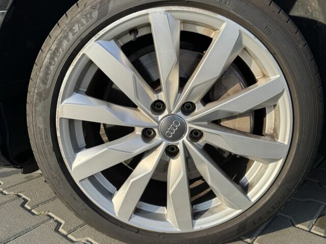 Чорний Ауді А4, об'ємом двигуна 2 л та пробігом 170 тис. км за 16600 $, фото 5 на Automoto.ua