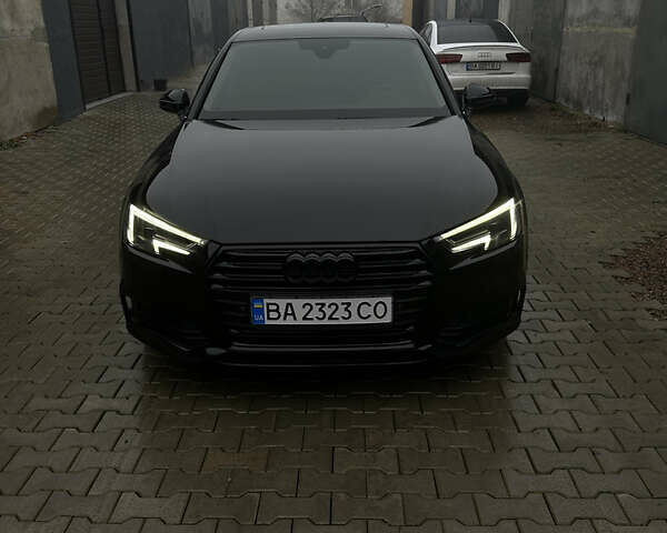 Черный Ауди А4, объемом двигателя 1.98 л и пробегом 86 тыс. км за 23000 $, фото 1 на Automoto.ua