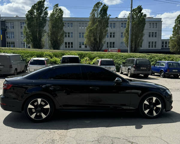 Черный Ауди А4, объемом двигателя 2 л и пробегом 165 тыс. км за 22500 $, фото 5 на Automoto.ua