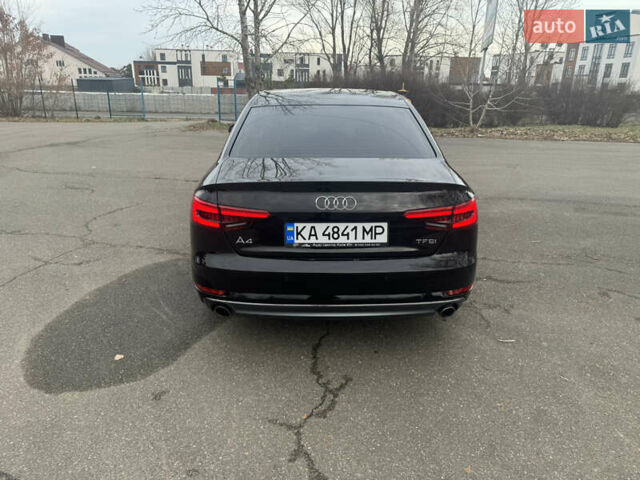 Черный Ауди А4, объемом двигателя 2 л и пробегом 140 тыс. км за 19500 $, фото 4 на Automoto.ua