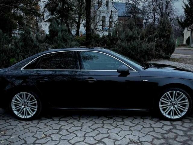 Черный Ауди А4, объемом двигателя 2 л и пробегом 100 тыс. км за 12200 $, фото 2 на Automoto.ua