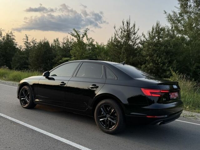 Черный Ауди А4, объемом двигателя 2 л и пробегом 230 тыс. км за 14999 $, фото 1 на Automoto.ua