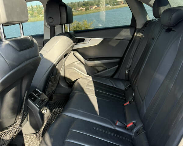 Ауді А4 2017 у Кривому Розі на Automoto.ua Чорний Ауді А4, об'ємом двигуна 1.98 л та пробігом 286 тис. км за 18500 $, фото 23 на Automoto.ua