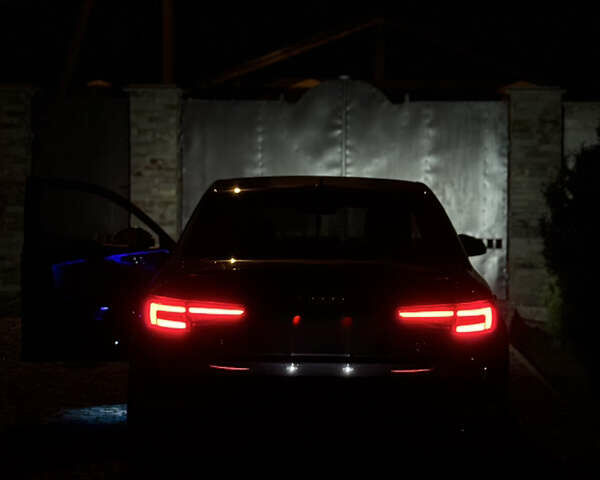 Черный Ауди А4, объемом двигателя 1.98 л и пробегом 65 тыс. км за 27500 $, фото 1 на Automoto.ua