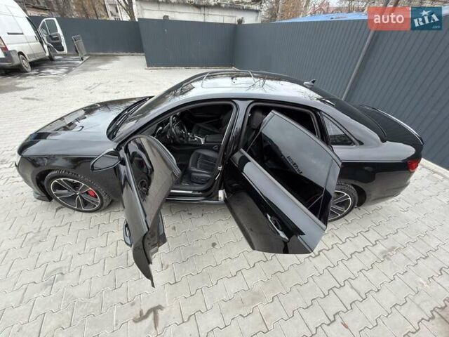 Черный Ауди А4, объемом двигателя 1.98 л и пробегом 155 тыс. км за 20499 $, фото 9 на Automoto.ua