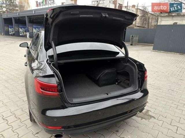 Черный Ауди А4, объемом двигателя 1.98 л и пробегом 155 тыс. км за 20499 $, фото 5 на Automoto.ua