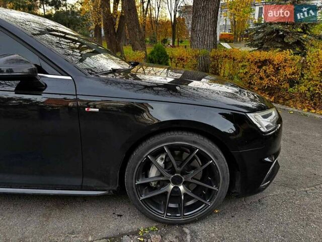 Чорний Ауді А4, об'ємом двигуна 2 л та пробігом 115 тис. км за 22390 $, фото 4 на Automoto.ua
