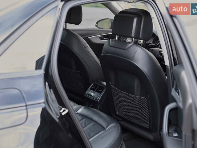 Черный Ауди А4, объемом двигателя 1.98 л и пробегом 123 тыс. км за 18000 $, фото 26 на Automoto.ua