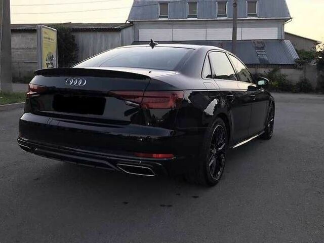 Черный Ауди А4, объемом двигателя 2 л и пробегом 35 тыс. км за 14000 $, фото 5 на Automoto.ua