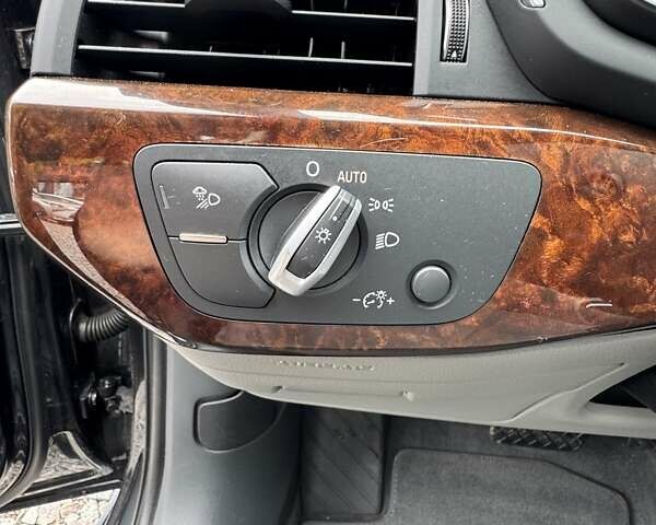 Черный Ауди А4, объемом двигателя 1.98 л и пробегом 54 тыс. км за 18990 $, фото 2 на Automoto.ua