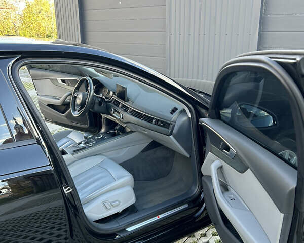 Чорний Ауді А4, об'ємом двигуна 2 л та пробігом 49 тис. км за 17800 $, фото 24 на Automoto.ua