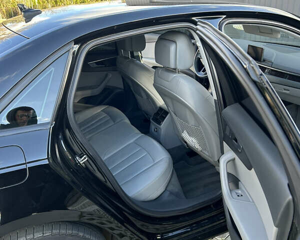 Чорний Ауді А4, об'ємом двигуна 2 л та пробігом 49 тис. км за 17800 $, фото 26 на Automoto.ua