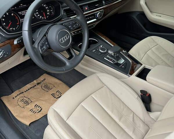 Черный Ауди А4, объемом двигателя 1.98 л и пробегом 109 тыс. км за 19400 $, фото 12 на Automoto.ua