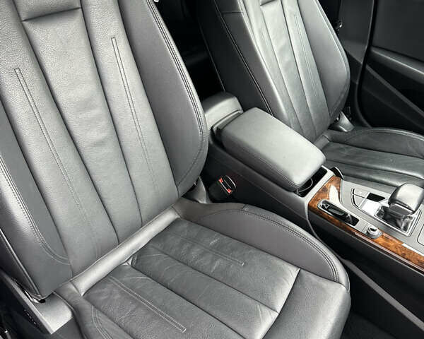 Черный Ауди А4, объемом двигателя 1.98 л и пробегом 128 тыс. км за 20000 $, фото 18 на Automoto.ua