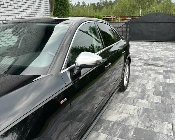 Черный Ауди А4, объемом двигателя 1.98 л и пробегом 128 тыс. км за 20000 $, фото 12 на Automoto.ua