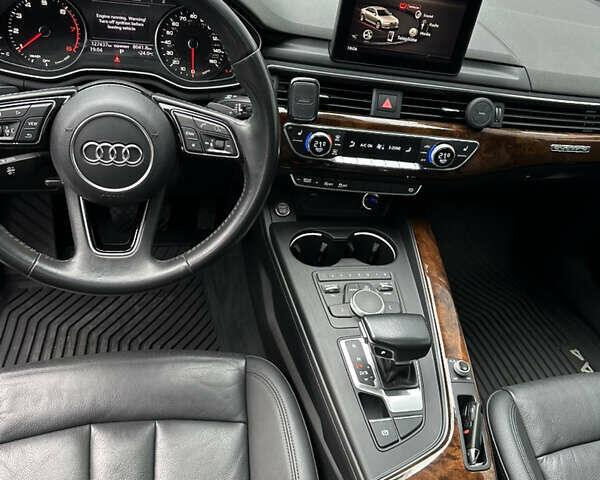 Черный Ауди А4, объемом двигателя 1.98 л и пробегом 128 тыс. км за 20000 $, фото 24 на Automoto.ua