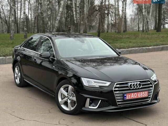 Черный Ауди А4, объемом двигателя 2 л и пробегом 77 тыс. км за 21999 $, фото 1 на Automoto.ua