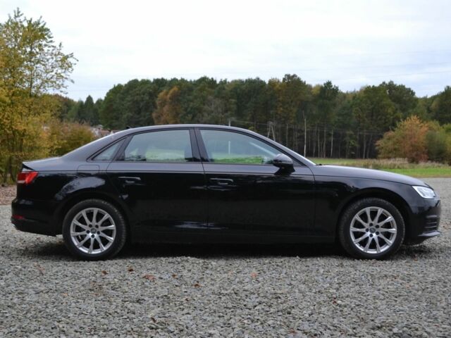 Черный Ауди А4, объемом двигателя 2 л и пробегом 62 тыс. км за 12900 $, фото 6 на Automoto.ua