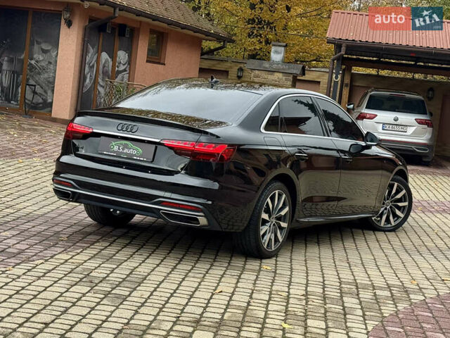 Чорний Ауді А4, об'ємом двигуна 2 л та пробігом 55 тис. км за 23800 $, фото 1 на Automoto.ua