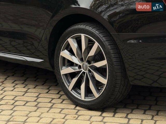 Чорний Ауді А4, об'ємом двигуна 2 л та пробігом 55 тис. км за 23800 $, фото 18 на Automoto.ua