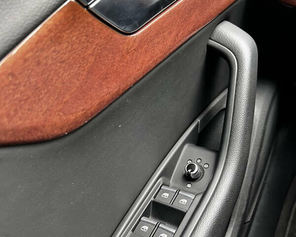 Черный Ауди А4, объемом двигателя 1.98 л и пробегом 42 тыс. км за 28000 $, фото 14 на Automoto.ua