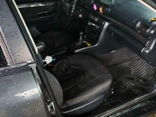 Черный Ауди А4, объемом двигателя 1.8 л и пробегом 401 тыс. км за 2200 $, фото 5 на Automoto.ua