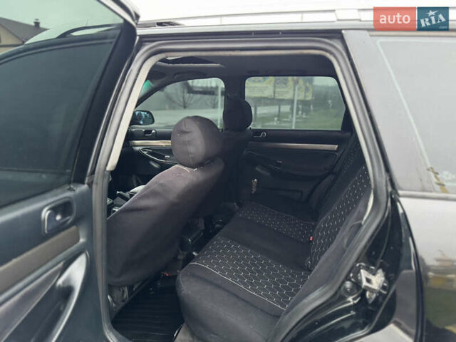 Черный Ауди А4, объемом двигателя 1.9 л и пробегом 394 тыс. км за 3500 $, фото 12 на Automoto.ua