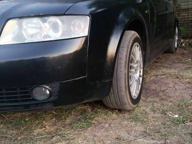 Черный Ауди А4, объемом двигателя 2 л и пробегом 300 тыс. км за 3000 $, фото 7 на Automoto.ua