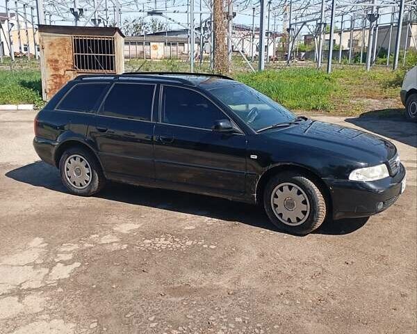 Черный Ауди А4, объемом двигателя 1.6 л и пробегом 254 тыс. км за 4100 $, фото 1 на Automoto.ua