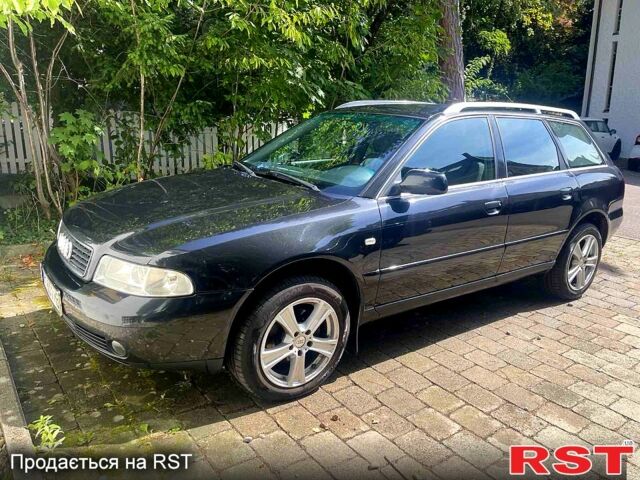 Черный Ауди А4, объемом двигателя 1.6 л и пробегом 290 тыс. км за 4800 $, фото 1 на Automoto.ua