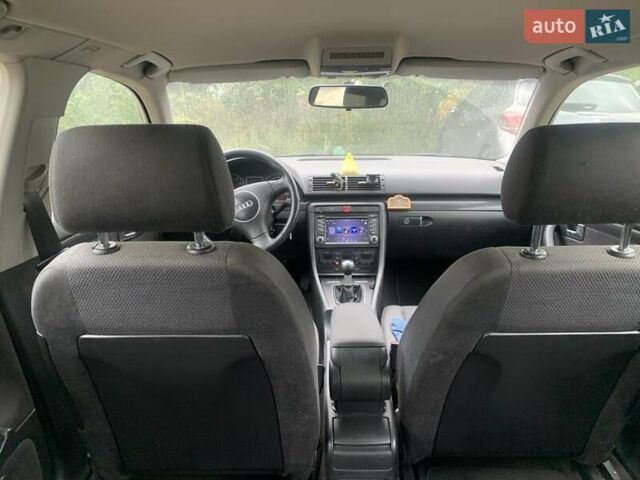 Черный Ауди А4, объемом двигателя 1.6 л и пробегом 325 тыс. км за 4550 $, фото 7 на Automoto.ua