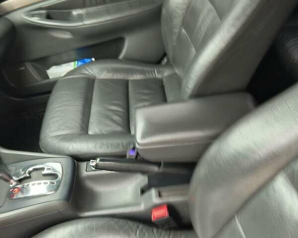 Черный Ауди А4, объемом двигателя 1.9 л и пробегом 258 тыс. км за 5600 $, фото 2 на Automoto.ua