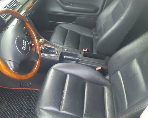 Черный Ауди А4, объемом двигателя 1.98 л и пробегом 225 тыс. км за 5200 $, фото 5 на Automoto.ua
