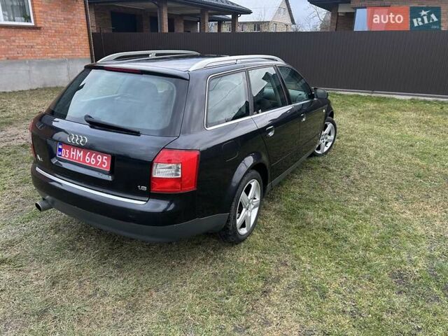 Черный Ауди А4, объемом двигателя 1.6 л и пробегом 219 тыс. км за 4950 $, фото 7 на Automoto.ua