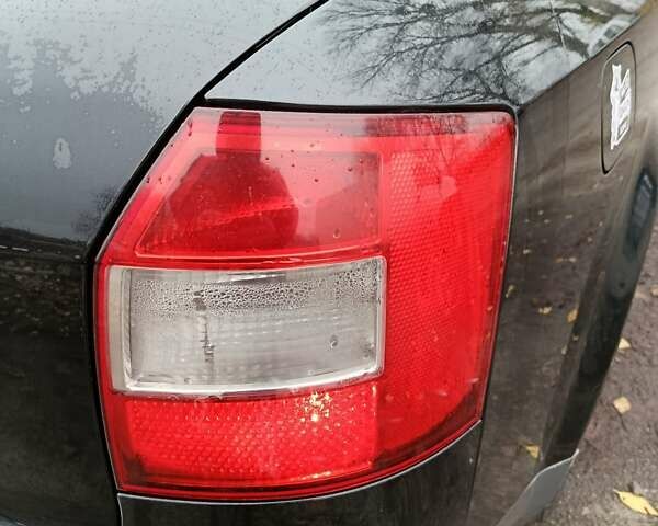 Черный Ауди А4, объемом двигателя 2.5 л и пробегом 300 тыс. км за 4500 $, фото 13 на Automoto.ua