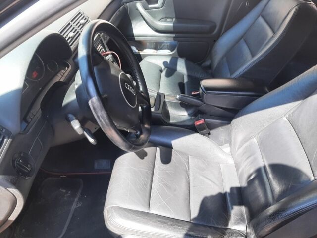 Черный Ауди А4, объемом двигателя 2.5 л и пробегом 313 тыс. км за 4400 $, фото 4 на Automoto.ua