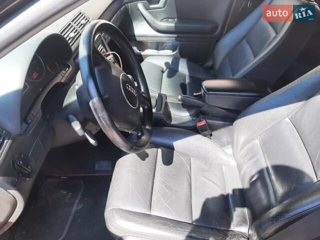 Черный Ауди А4, объемом двигателя 2.5 л и пробегом 313 тыс. км за 4400 $, фото 5 на Automoto.ua