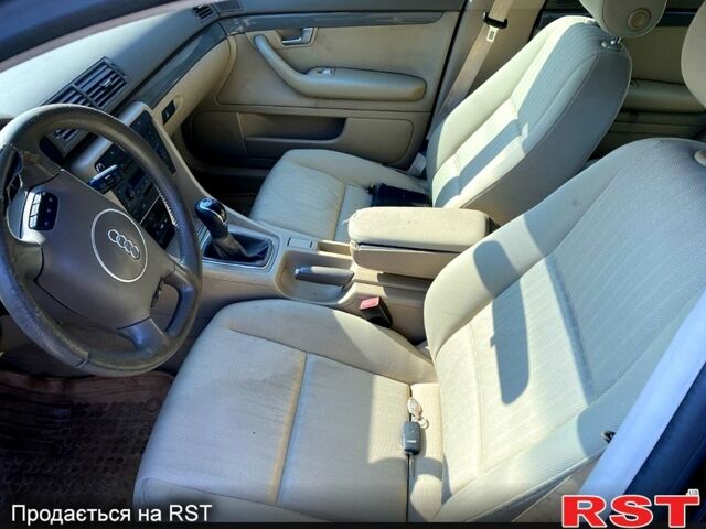 Черный Ауди А4, объемом двигателя 2.5 л и пробегом 200 тыс. км за 1300 $, фото 1 на Automoto.ua