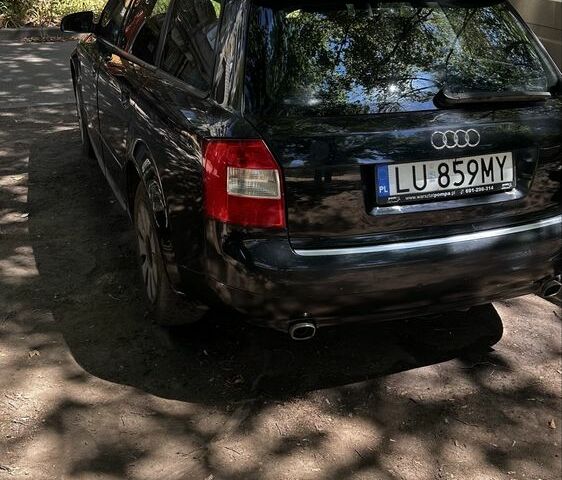 Черный Ауди А4, объемом двигателя 2.5 л и пробегом 340 тыс. км за 2062 $, фото 1 на Automoto.ua