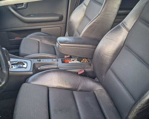 Черный Ауди А4, объемом двигателя 2.5 л и пробегом 321 тыс. км за 5500 $, фото 4 на Automoto.ua