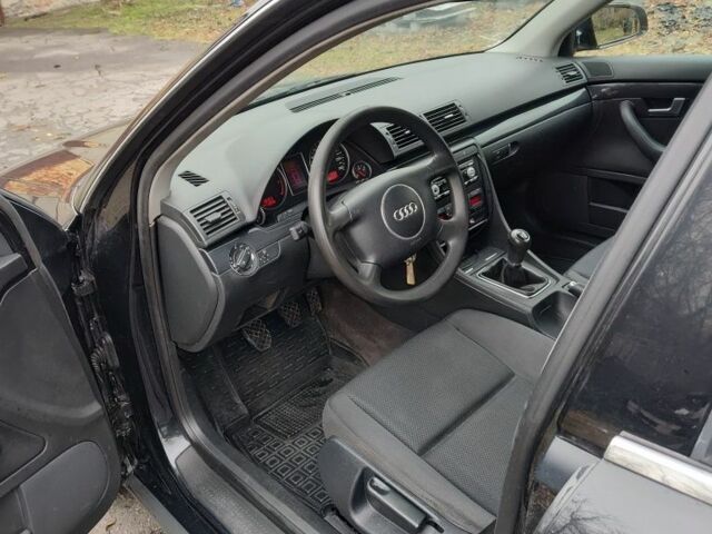 Черный Ауди А4, объемом двигателя 1.6 л и пробегом 265 тыс. км за 4950 $, фото 6 на Automoto.ua