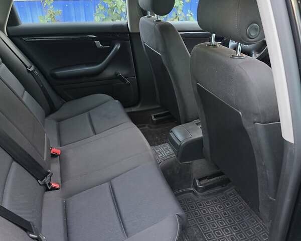 Черный Ауди А4, объемом двигателя 2 л и пробегом 220 тыс. км за 5000 $, фото 9 на Automoto.ua