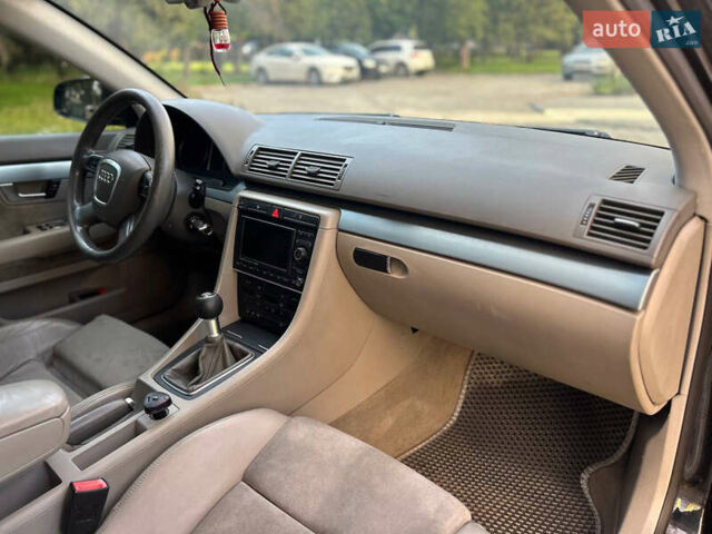 Чорний Ауді А4, об'ємом двигуна 2 л та пробігом 395 тис. км за 5950 $, фото 42 на Automoto.ua